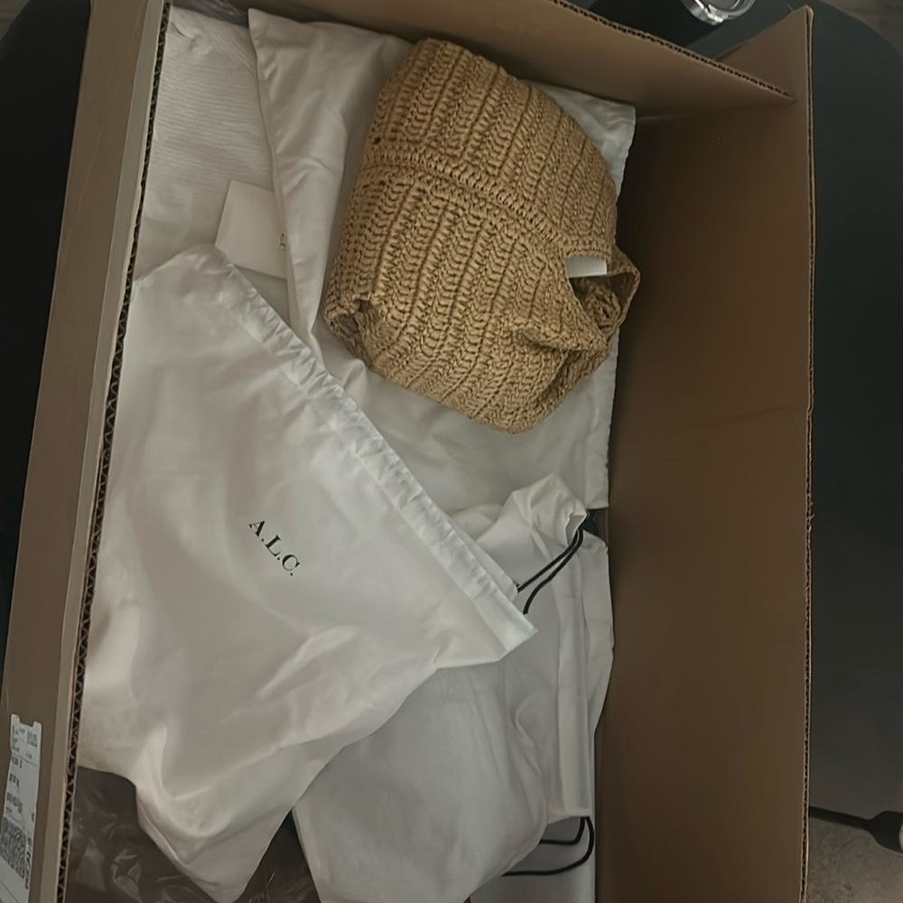 ALC dust bags and 5 sweaters in large box